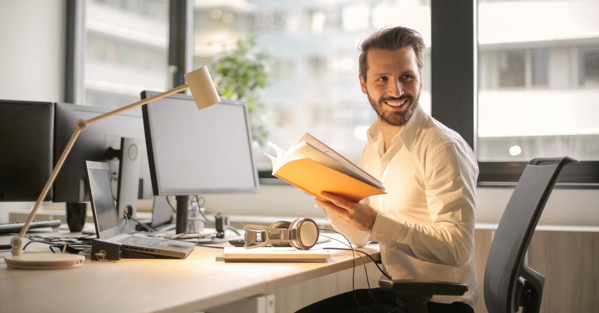 144hz Monitor refreshing on 60hz [closed] - Photo of Man Holding a Book