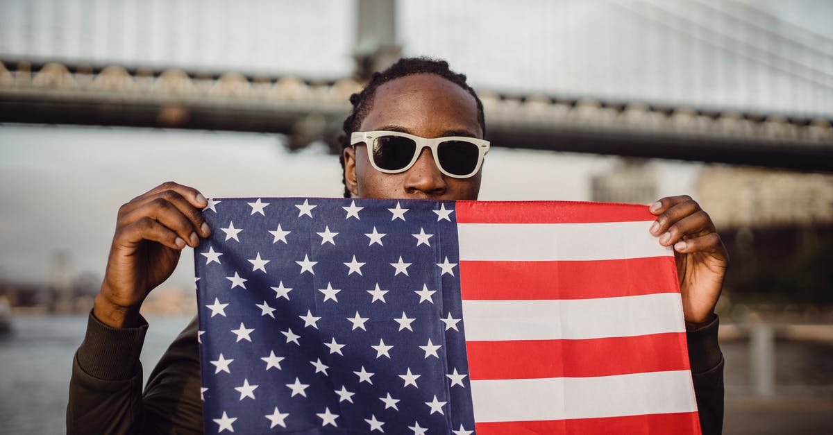 AC: Black Flag multiplayer functional? - Young African American male with American Flag bandana against bridge