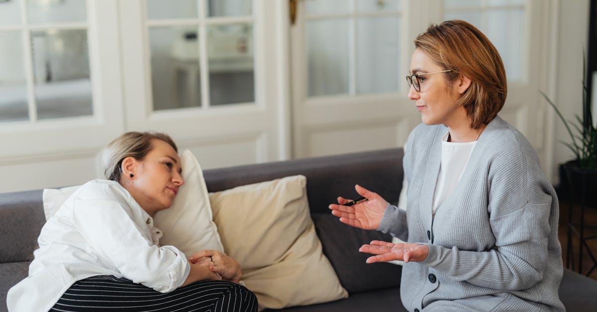 Am I penalized for support characters dying? - Women Sitting on a Couch and Talking 