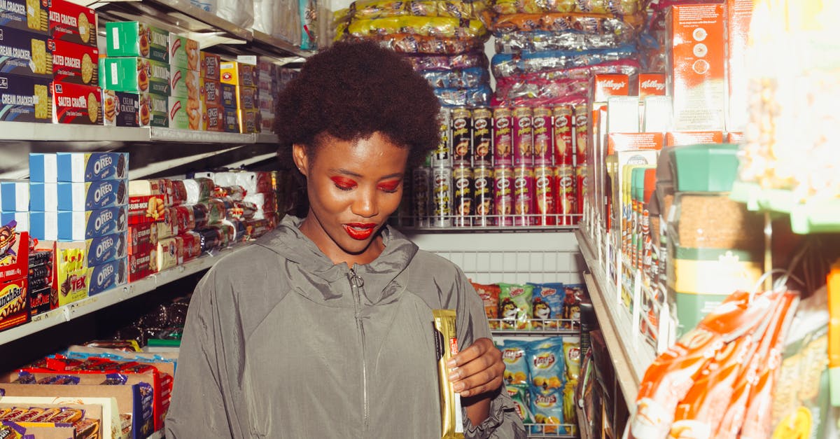 Any explanation for intricacies (bugs) of the city and trade network? - Positive ethnic woman choosing food in grocery store Any explanation for intricacies (bugs) of the city and trade network? - Positive ethnic woman choosing food in grocery store