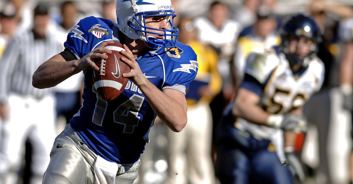 Are Heavy Balls better for catching legendaries than Timer Balls? - Selective Focus Photography of Man Holding Nike Football Ball