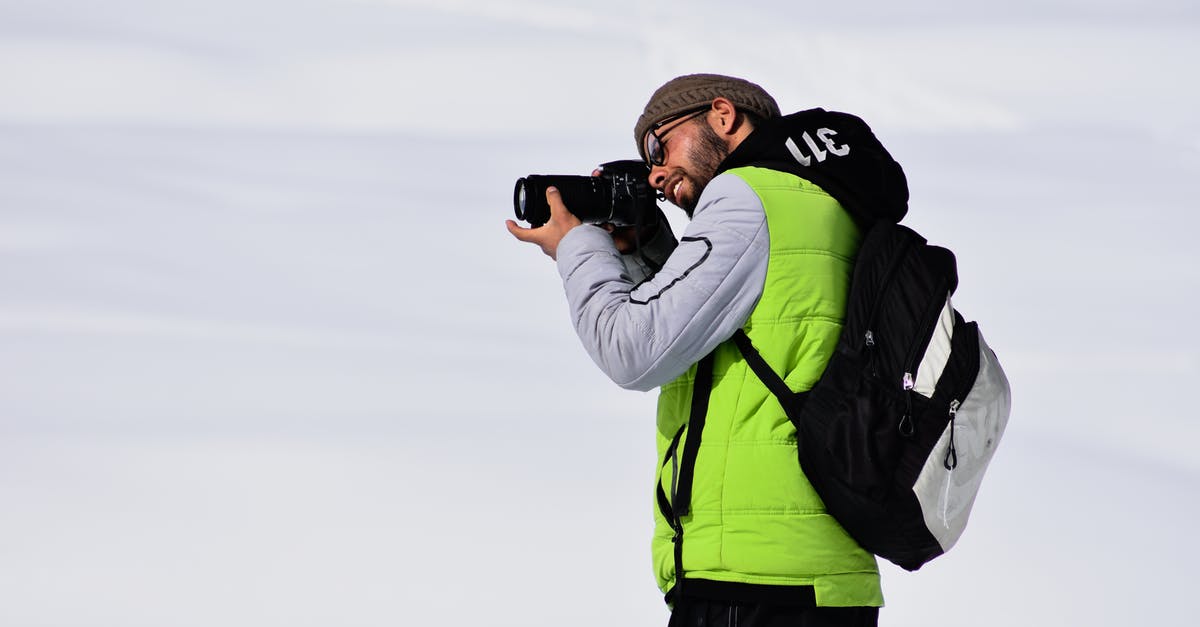 Are Holo-Packs predetermined? - Man Taking Pictures with a Dslr