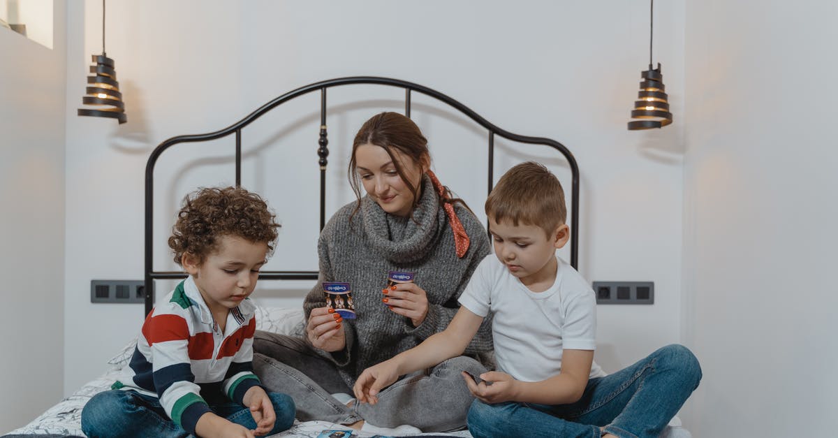 Are the cards a one-time use? - Mother and Kids Playing Cards on the Bed