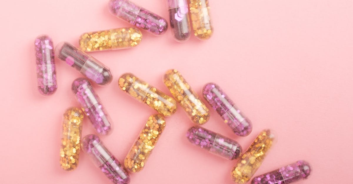 Are there any droids that heal - Pile of sparkling drug capsules scattered on pink surface