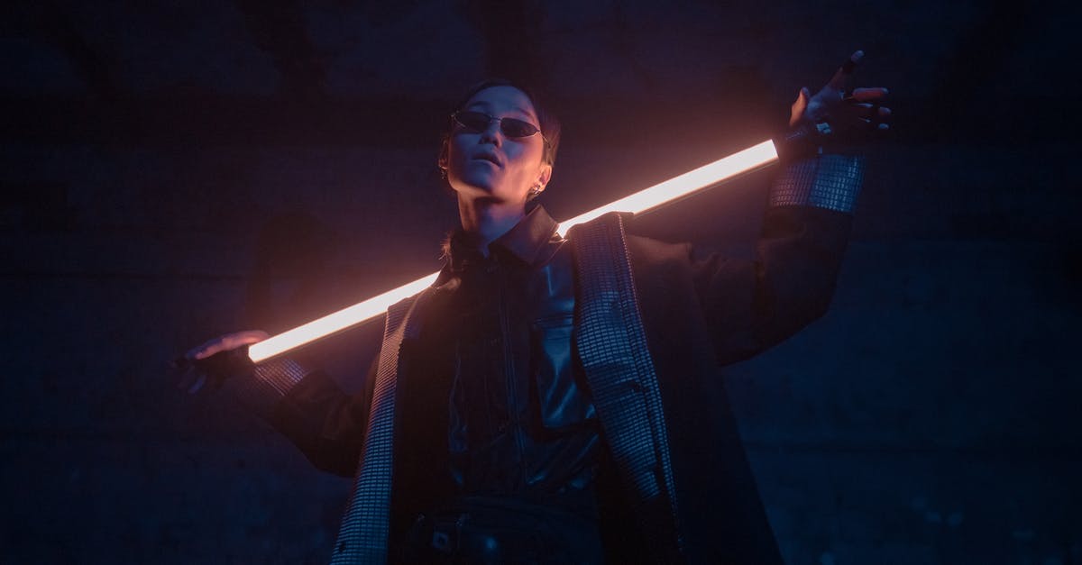 Are there enemies immune to quickhacks in Cyberpunk 2077? - Man in Black Suit Holding Microphone