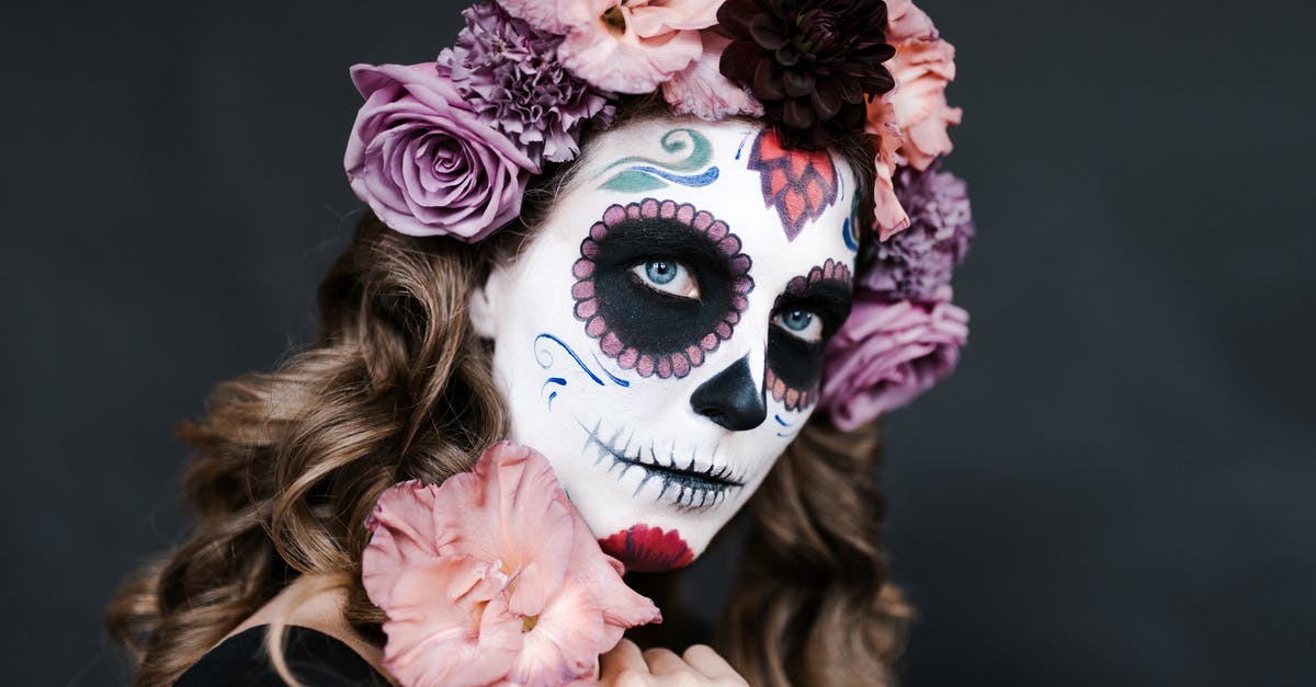 Are there missable achievements in The Walking Dead season 2? - Young female with sugar skull make up and hair decorated with flowers for celebrating Halloween