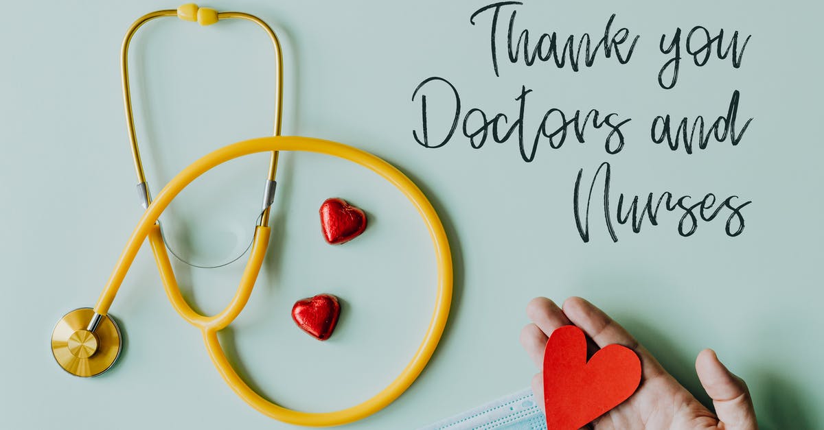 Are you able to testfor people somewhere on a countdown? - Yellow stethoscope composed with red hearts on white background with thank you doctors and nurses text and medical mask