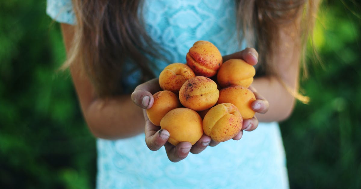 Benefits of holding many souls at once - Girl Holding Yellow Round Fruits