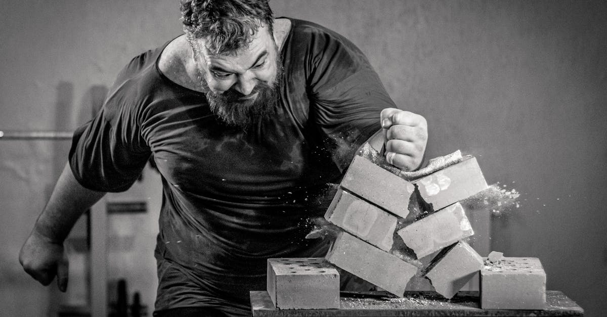 Blocks reappearing after breaking - A Man Breaking Concrete Block Using His Hand