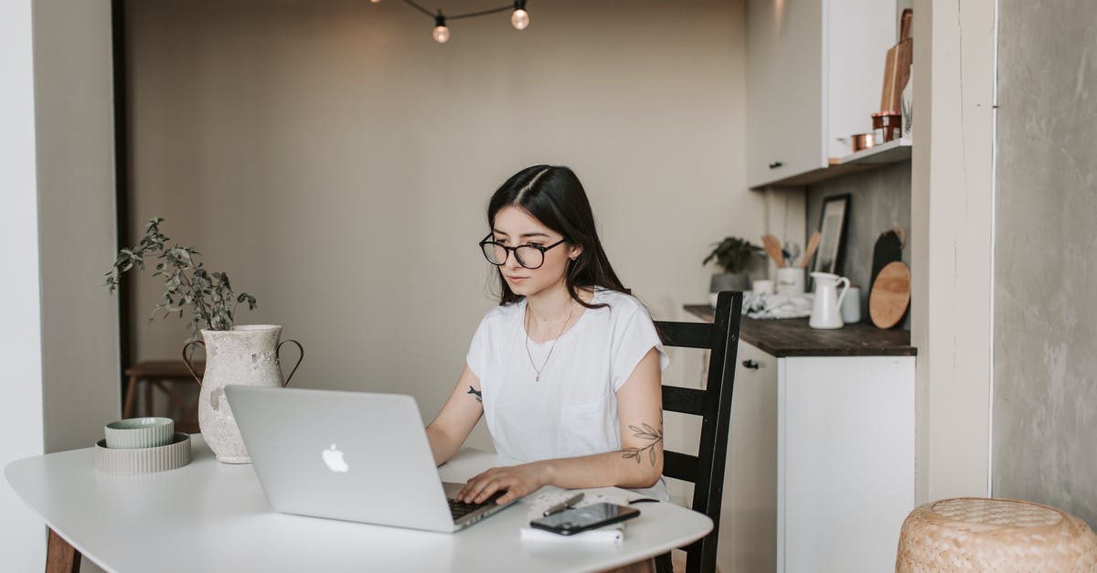 Can't join any Servers on PC Minecraft - Focused young businesswoman using laptop at home