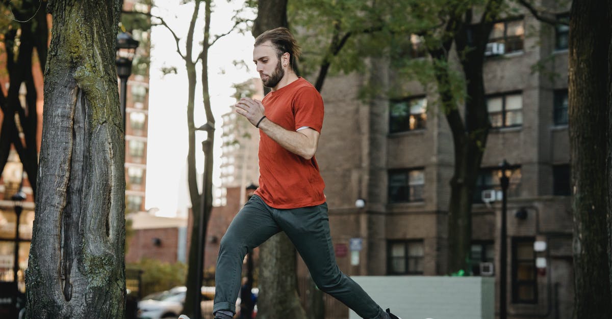 Can't run any program in - Bearded sportsman running on urban stairs during training