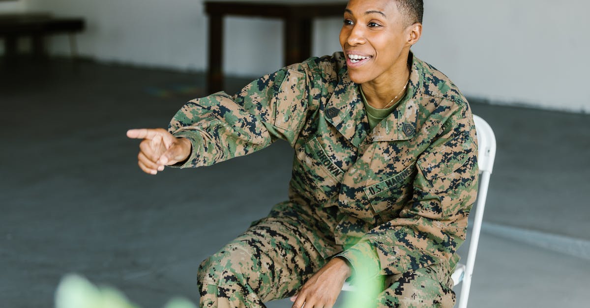 Can a revived hero contest a point? - Photo of Soldier in Military Uniform Sitting on a Folding Chair