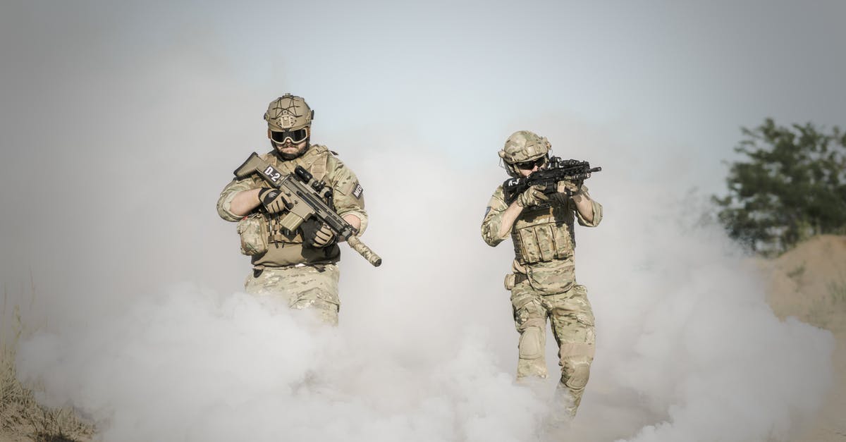 Can a single default attack trigger multiple triggered attacks? - Men Holding Rifle While Walking Through Smoke Grenade