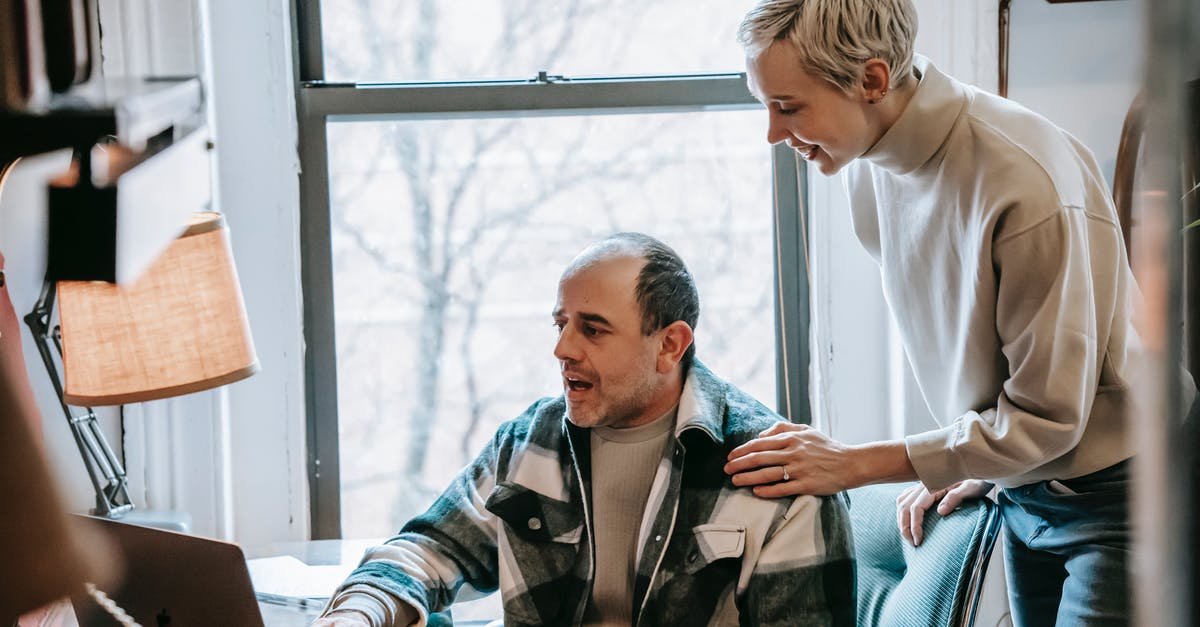 Can anyone tell me what are the uses of a Redstone Comparator? - Cheerful woman helping colleague with laptop Can anyone tell me what are the uses of a Redstone Comparator? - Cheerful woman helping colleague with laptop
