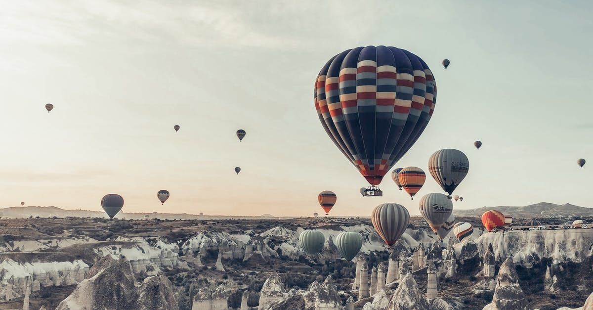 Can I de-rockify rocky terrain in SMAC - Multicolored hot air balloons flying above famous vast rocky valley in Cappadocia Turkey on early morning on fair weather