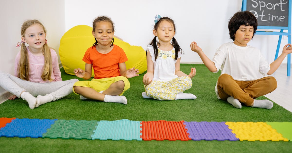 Can I play cross-platform multiplayer? - Children Sitting on Green Mat In Yoga Position