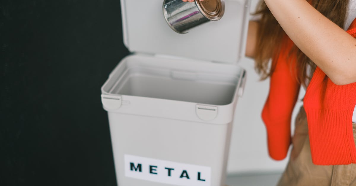 Can I save my highlights? - Woman sorting garbage and putting metal can into bucket