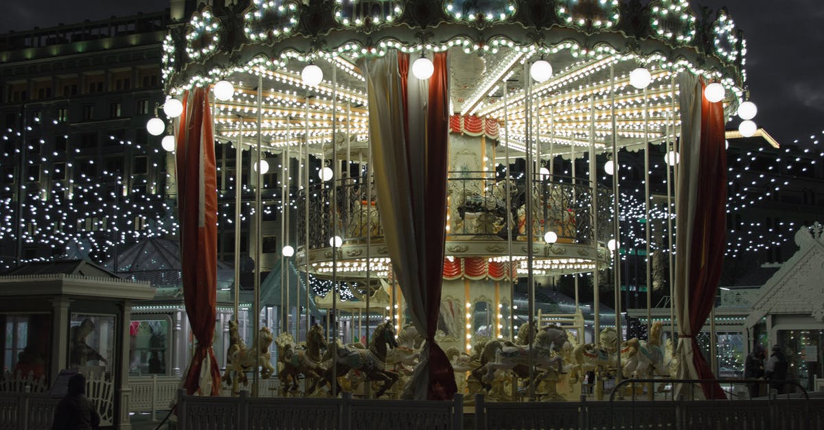 Can I still play Unikong? - Illuminated merry go round in amusement park at night