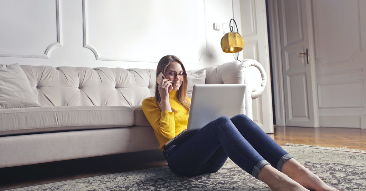 Can I use Steam Family Sharing with five user accounts plus one account per game? - Smiling barefoot female in glasses and casual clothes using laptop and having phone call while sitting on floor leaning on sofa and working on laptop against luxury interior of light living room Can I use Steam Family Sharing with five user accounts plus one account per game? - Smiling barefoot female in glasses and casual clothes using laptop and having phone call while sitting on floor leaning on sofa and working on laptop against luxury interior of light living room