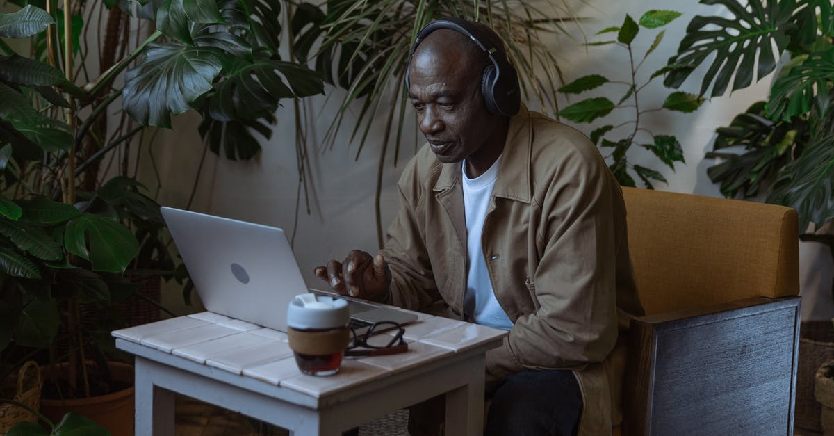 Can not extend Antennae after data transmission - Photo of an Old Man Using Laptop