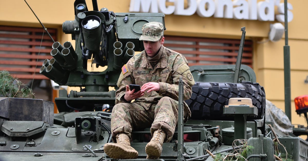 Can only send 1 unit for Combat Deployment - Man In Brown Camouflage Sitting on Top of Tank