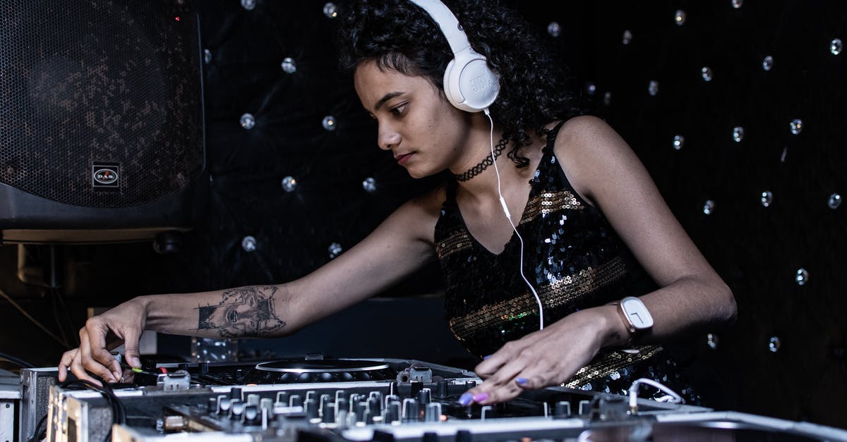 Can the smash ultimate gamecube controller be used on a gamecube? - Focused ethnic female DJ playing music at nightclub