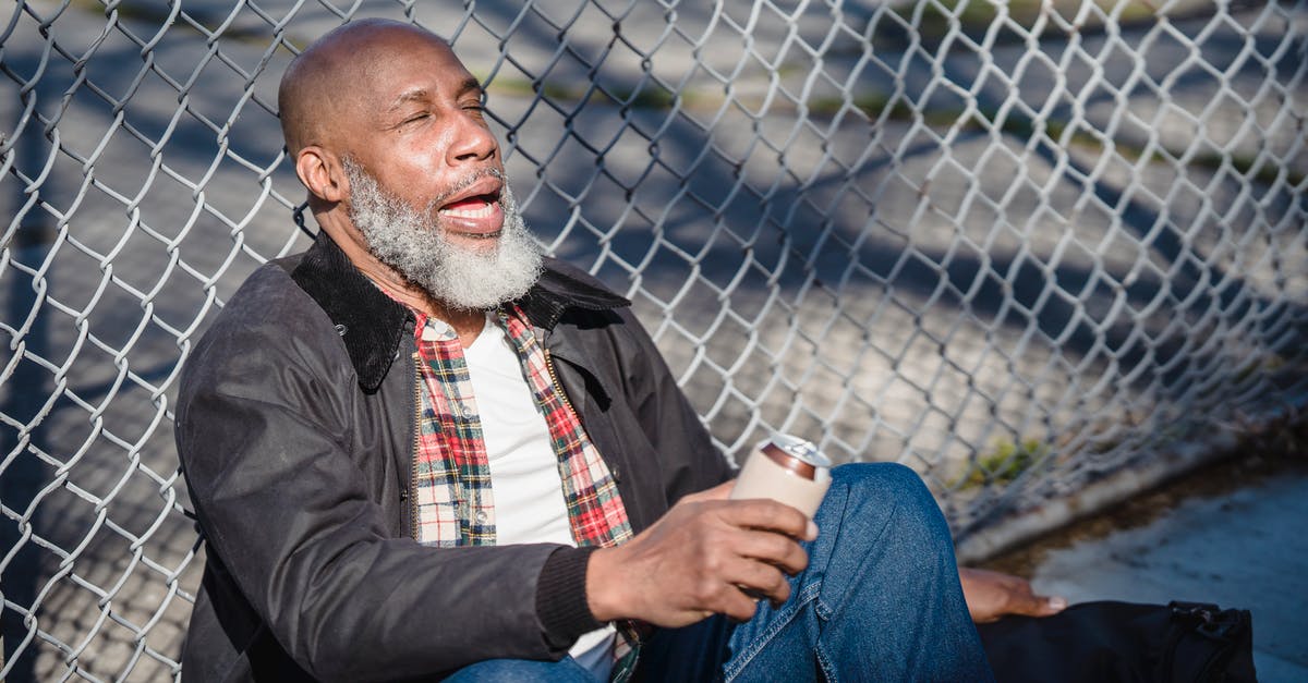 Can we use sleep arrows instead of tranq bombs to capture a monster? - African American senior man with closed eyes and opened mouth sitting near metal fence and holding beer can Can we use sleep arrows instead of tranq bombs to capture a monster? - African American senior man with closed eyes and opened mouth sitting near metal fence and holding beer can
