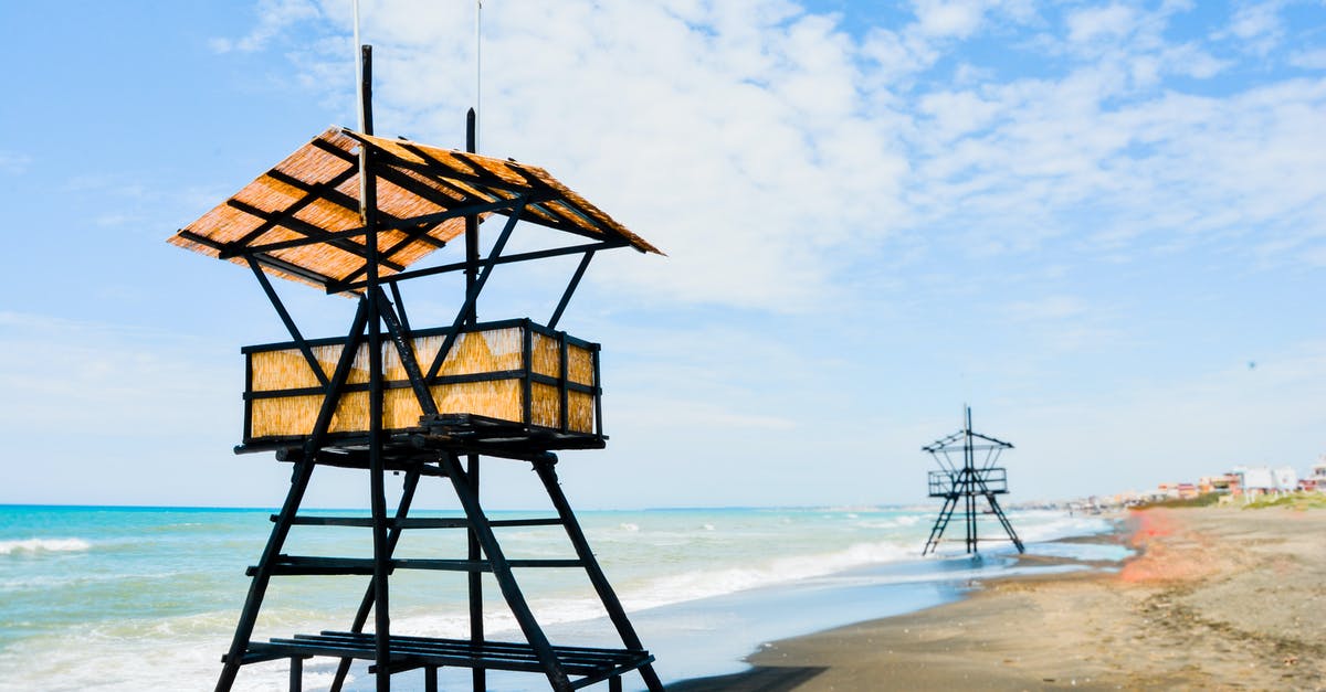 Can you clear Synthetic Insights without killing any guards? - Contemporary creative beach guard house constructions located on sandy seashore on clear sunny day