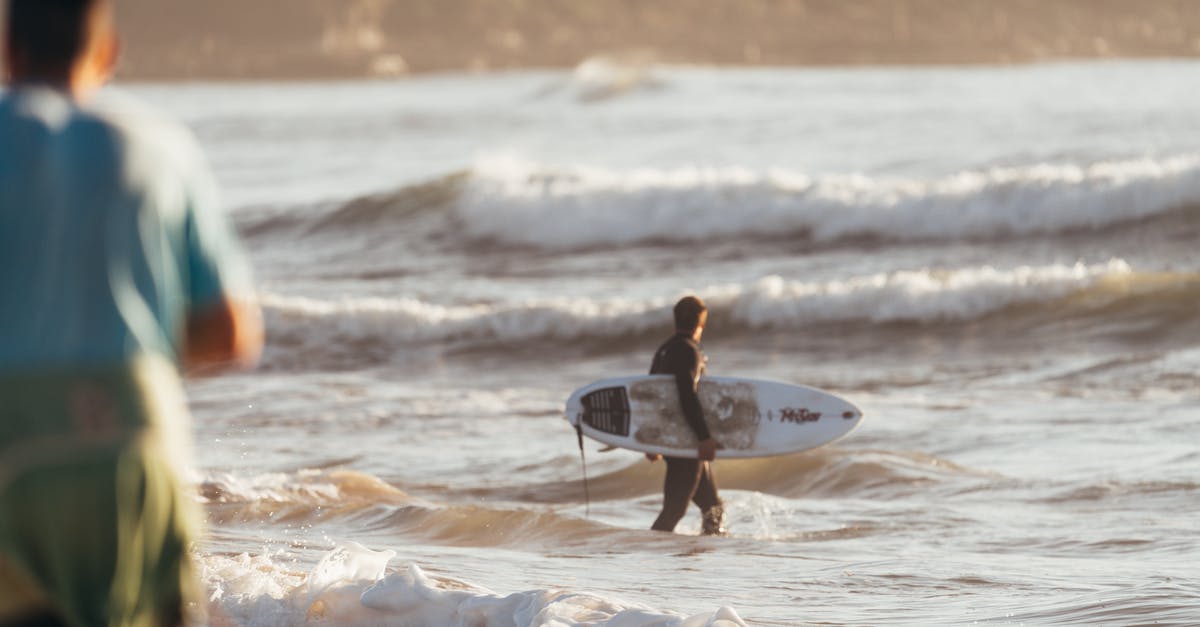 Can you pick up Pete's Watch in Walking Dead - Season 2 - Surfer walking in powerful wavy ocean