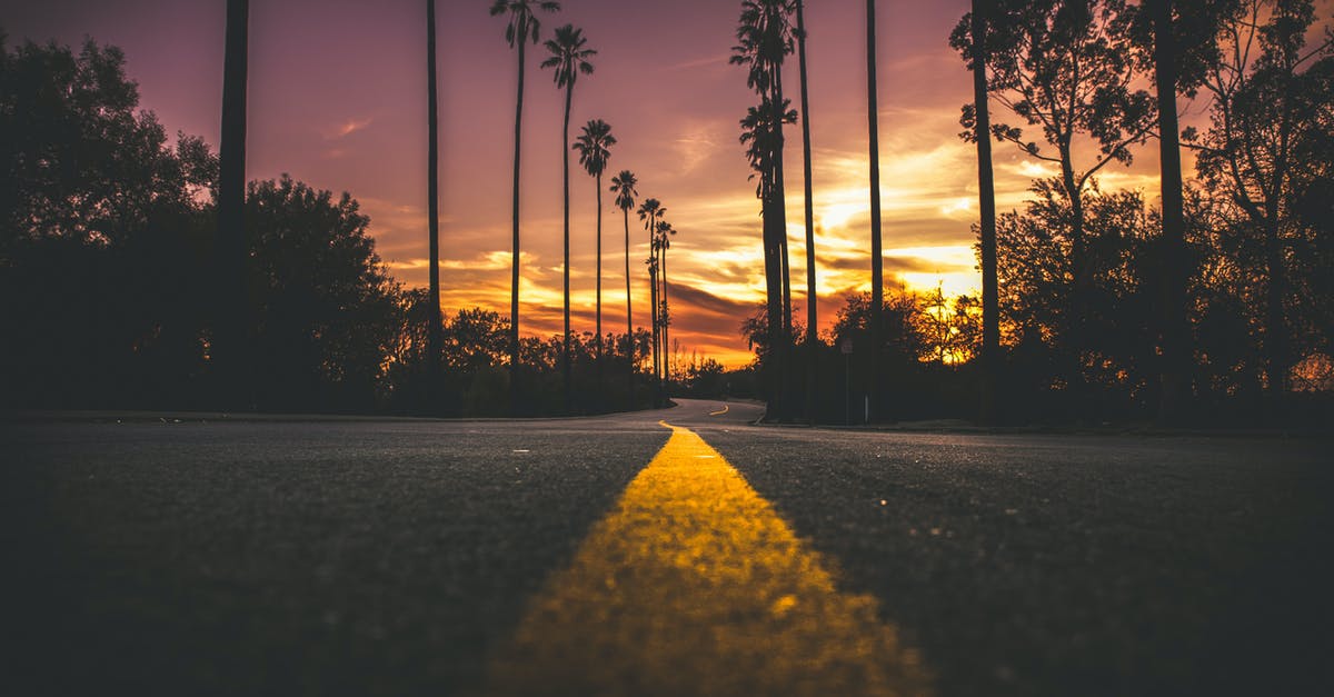 Can you synchronize & time signals over long distance? - Road in City during Sunset