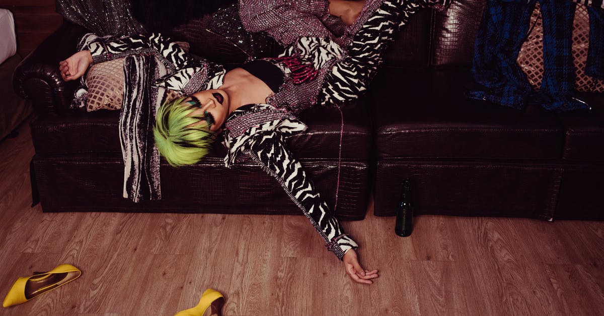 Chances of Hidden Ability through breeding, as well as chances for gender - Tired transsexual man with bright hairstyle and makeup in fashionable clothes resting on leather sofa after party Chances of Hidden Ability through breeding, as well as chances for gender - Tired transsexual man with bright hairstyle and makeup in fashionable clothes resting on leather sofa after party