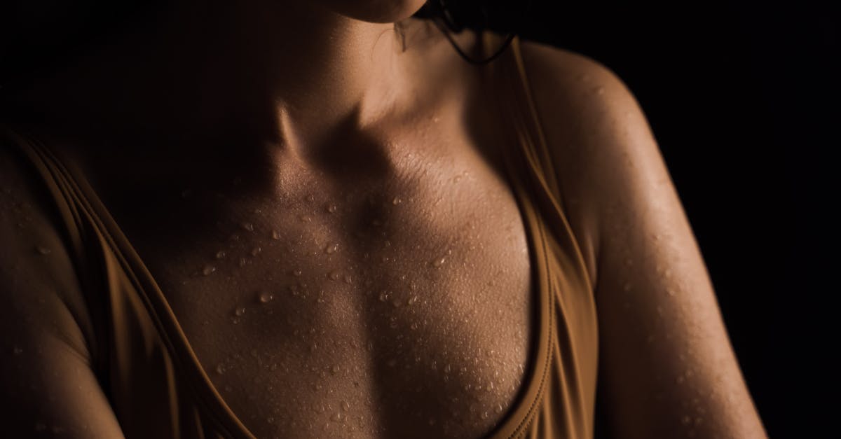 Chest contents leveling - Close Up Photo of Wet Chest of a Woman 