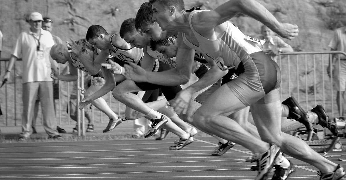 Civilization: game in real time with 10 players - Athletes Running on Track and Field Oval in Grayscale Photography