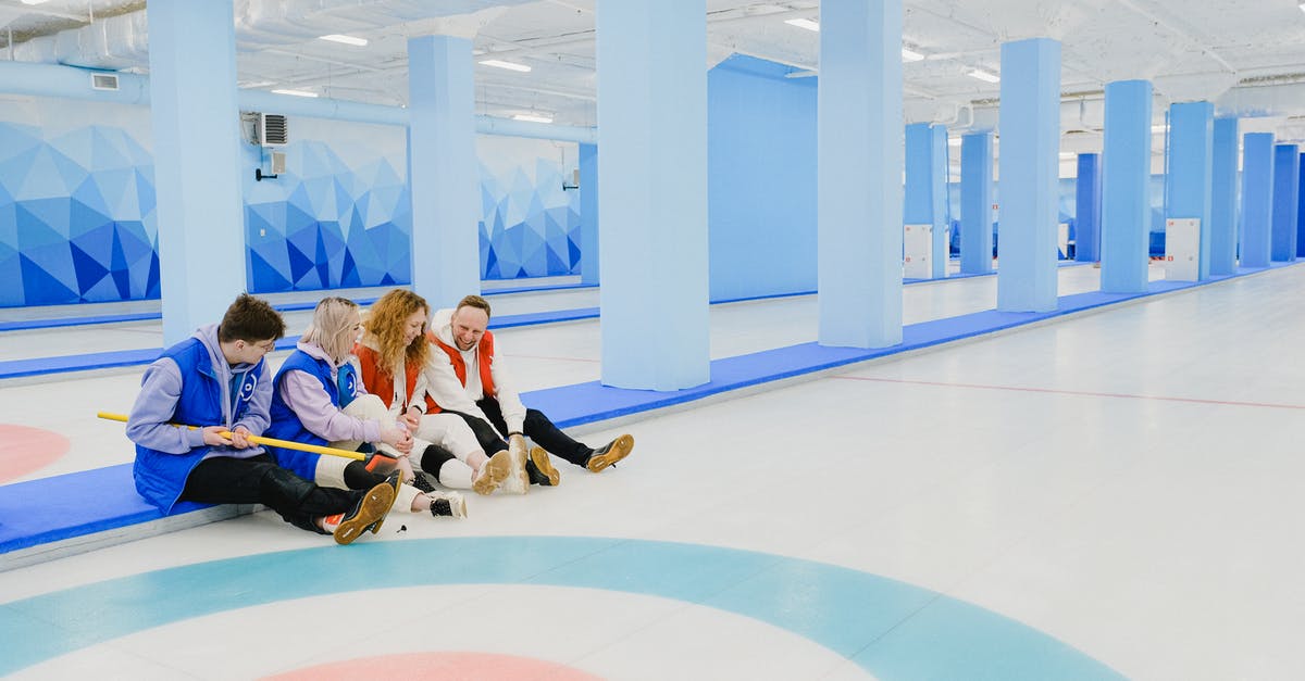 Command to say player coords in chat? - Group of sitting people spending time in curling arena