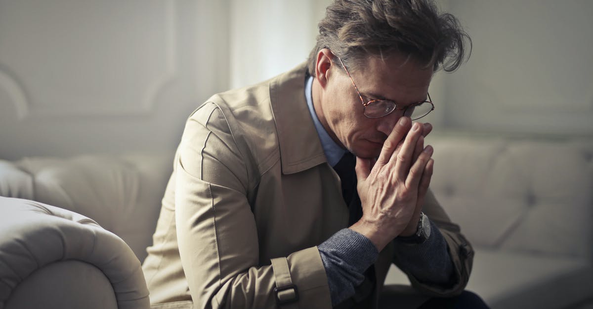 Copy/paste/select problem [duplicate] - Side view of upset male entrepreneur in formal wear sitting on couch in modern living room and contemplating about financial problems while leaning on hands and looking down