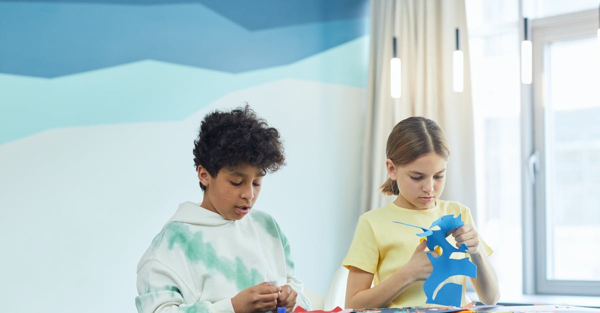 Crafting writ not registering as completed - Boy and Girl Cutting Colored Paper