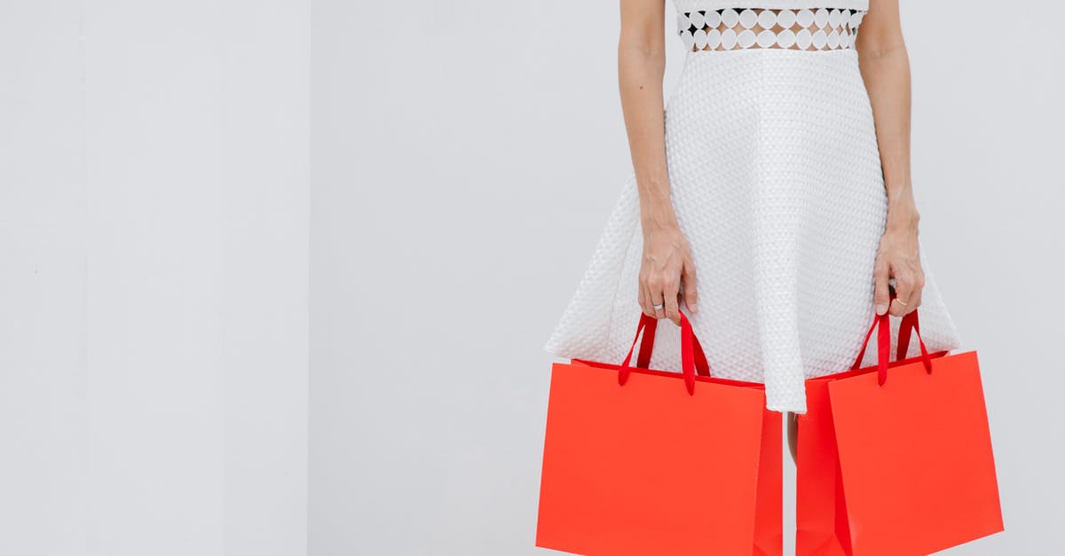 Custom armor stand name with multiple lines - Crop unrecognizable woman carrying red shopping bags in studio