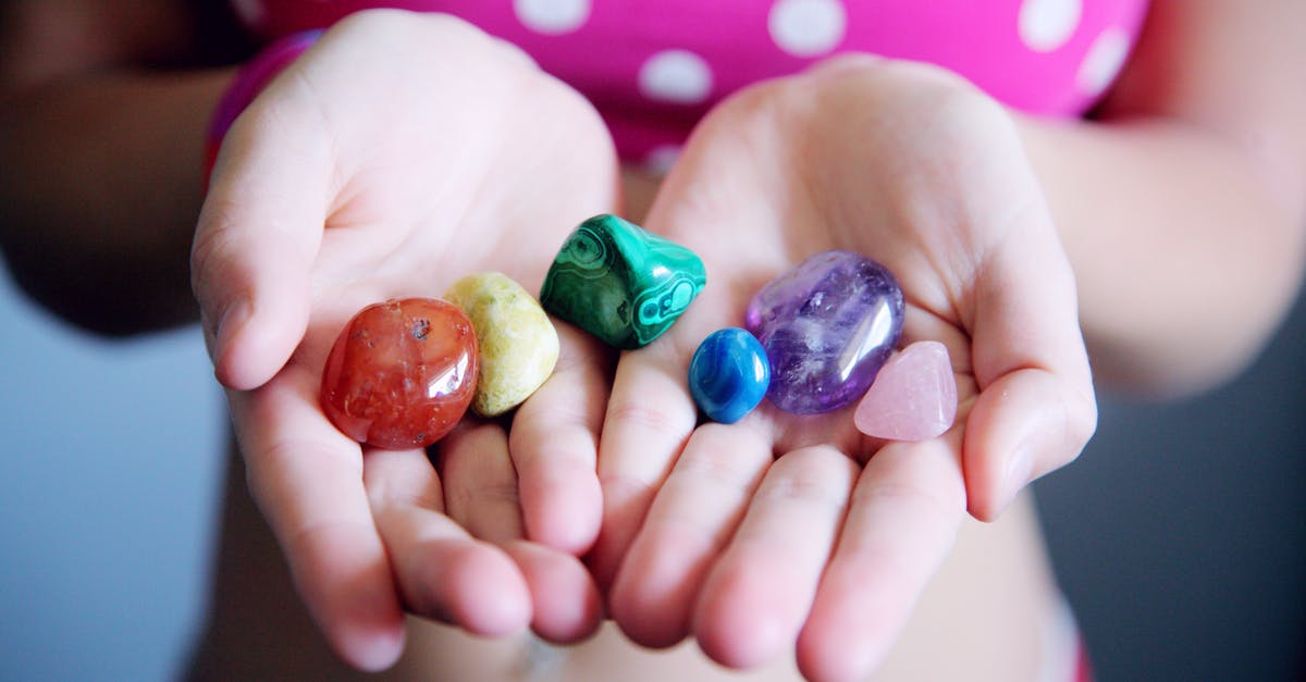 Difficulty Differences - Woman Holding Six Polished Stones