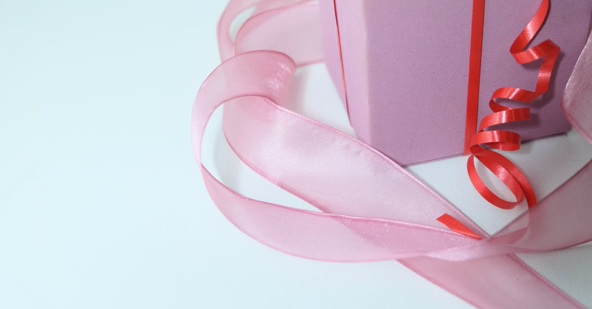 Do all the buyable crates give the same amount of crafting parts? - From above of pink cardboard present box decorated with colorful ribbons on gray background