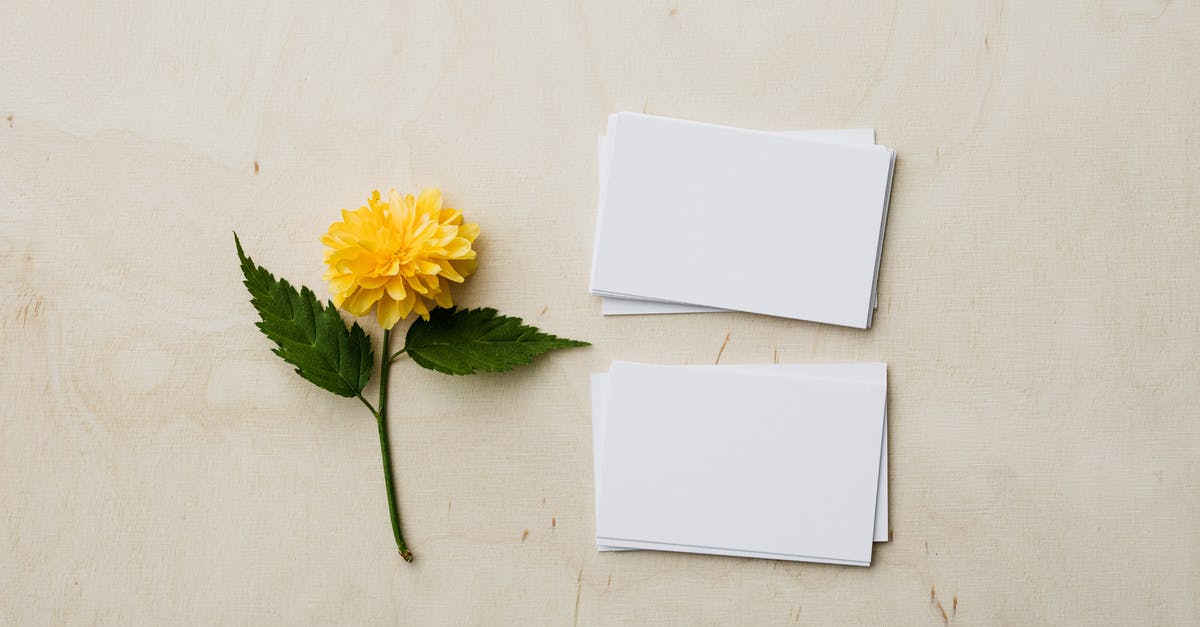 Do battle card effects stack? - Blank mockup business cards and yellow flower on desk