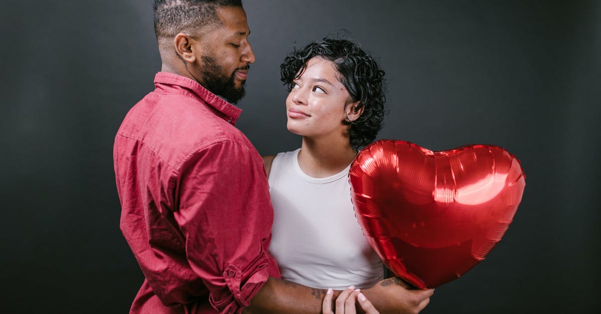 Do my troops recover fully after each battle? - Couple Looking at Each Other While Holding a Red Heart Shaped Balloon