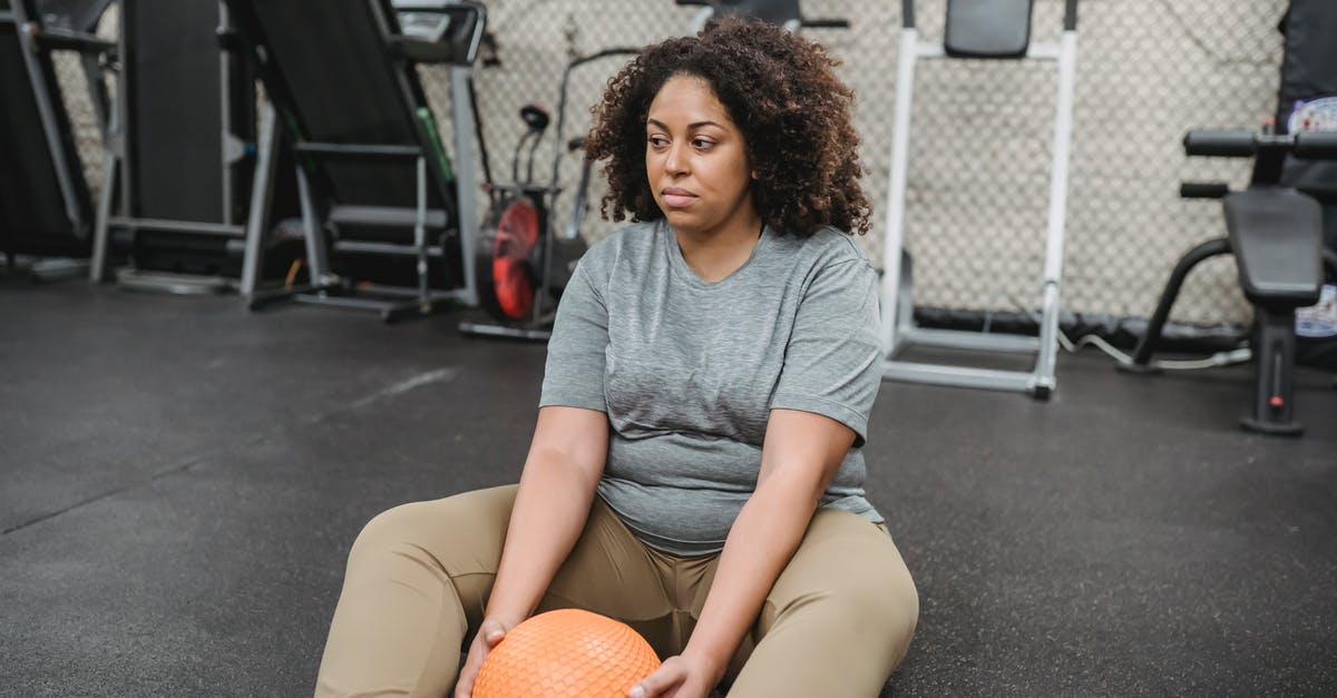 Do option recovery skills function while options are active? - Exhausted overweight black woman resting on floor after training in gym