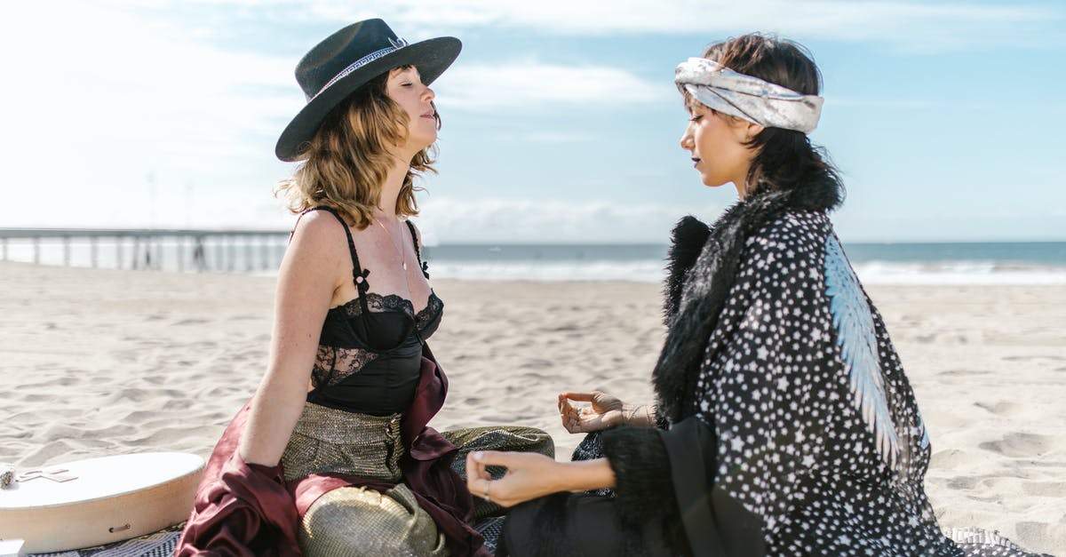 Do the Skaal believe in reincarnation or not? - 2 Women Sitting on Beach