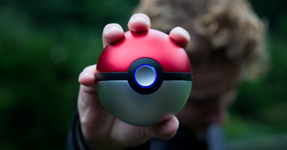 Does a Pokemon "lose" Pokerus while in the Pelago? - Person Holding Pokemon Ball Toy