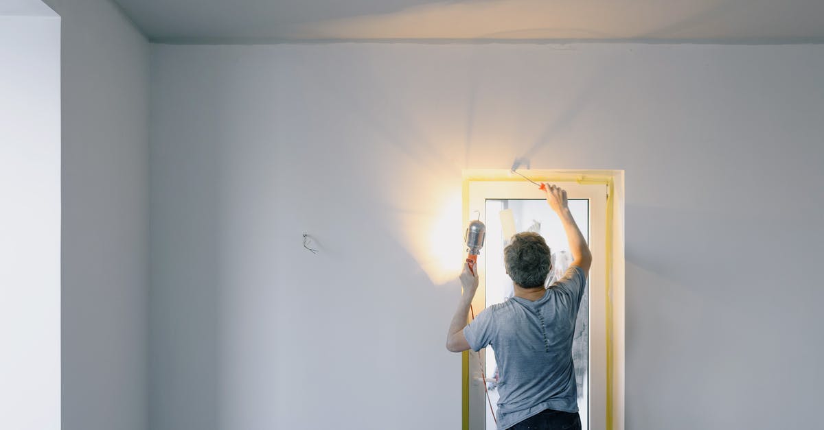 Does bankruptcy remove all buildings based on when their construction started or finished? - Faceless man repairing door in room Does bankruptcy remove all buildings based on when their construction started or finished? - Faceless man repairing door in room
