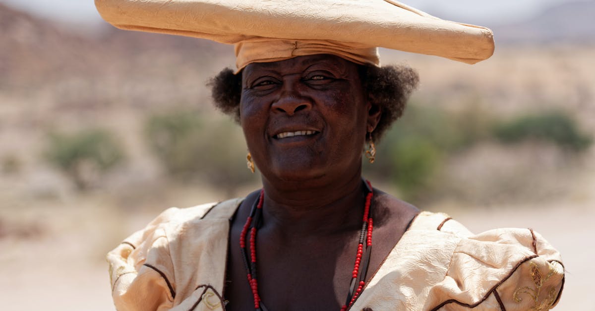 Does Big Hat Logan restock? - Woman Wearing A Big Yellow Hat Smiling