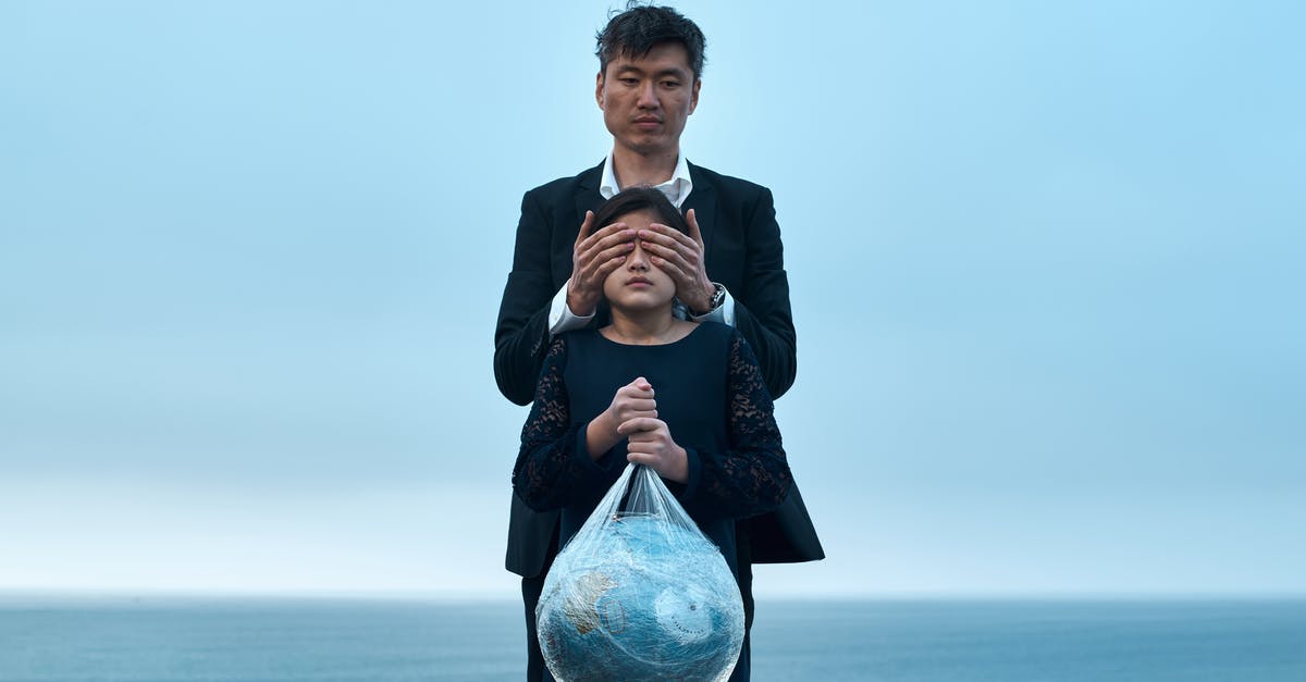 Does Cryo damage ignore damage resistance in Fallout 4? - Asian male in formal wear standing near seashore and covering eyes of girl in black dress with Earth globe in plastic bag environment pollution concept