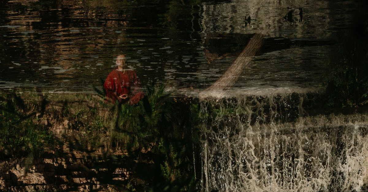 Does Dark Souls III follow Dark Souls and Dark Souls II in the storyline? - Person in Red Jacket Standing on Water Does Dark Souls III follow Dark Souls and Dark Souls II in the storyline? - Person in Red Jacket Standing on Water