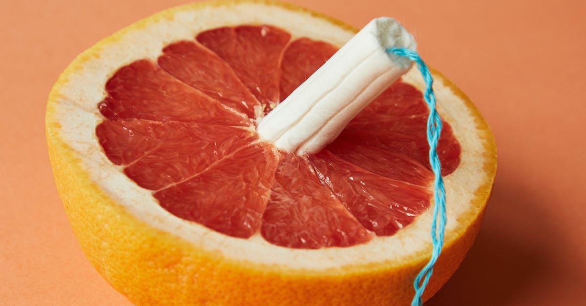 Does Evolve use horizontal or vertical FOV? - From above of half of sliced ripe grapefruit with tampon in center showing use of feminine product during menstruation