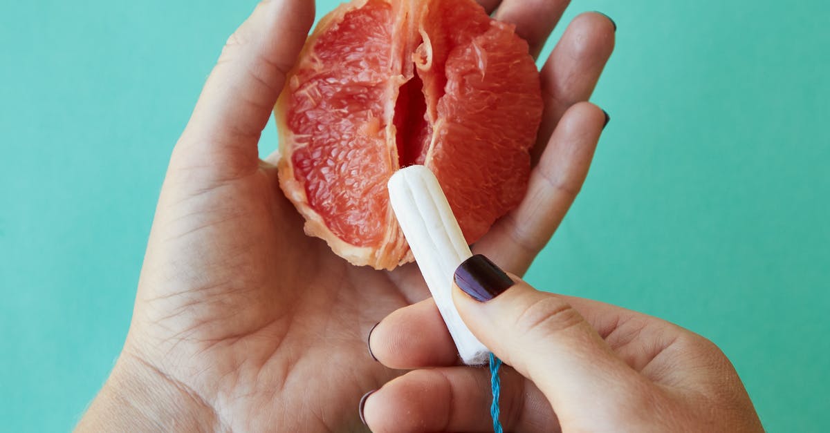 Does Evolve use horizontal or vertical FOV? - From above of crop anonymous female demonstrating on sliced ripe grapefruit correct use of tampon against blue background